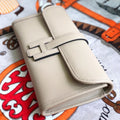 JIGE ELAN 29 CLUTCH IN ECRU TAN CALFSKIN