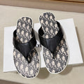 CD ALIAS THONG SNAKE MOTIF BLACK AND BEIGE CALFSKIN