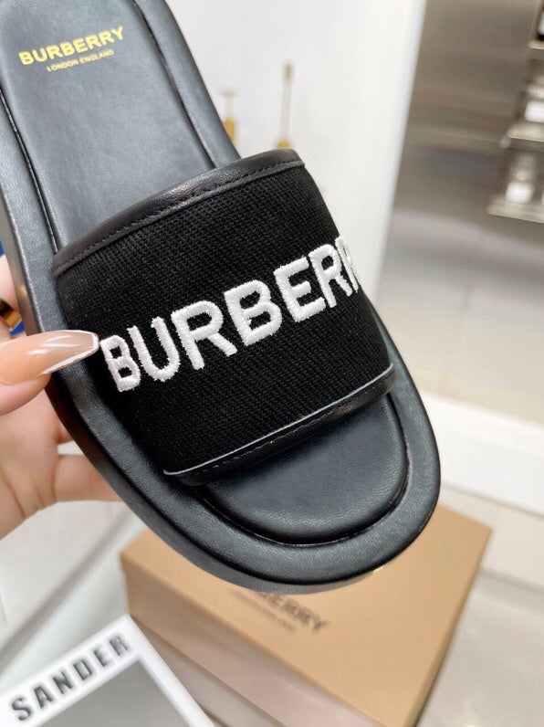 BURBERRY 26S SLIDE SANDALS IN BLACK CALFSKIN AND FABRIC