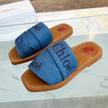 WOODY MULE IN COBALT BLUE DENIM WITH EMBROIDERED LOGO