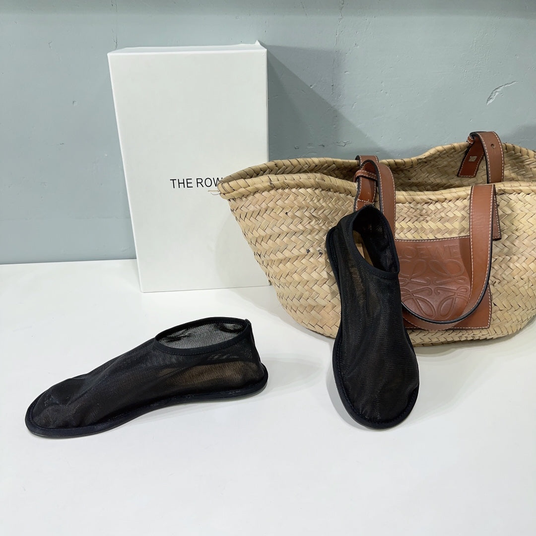 THE ROW 26S SOCK FLATS IN BLACK MESH