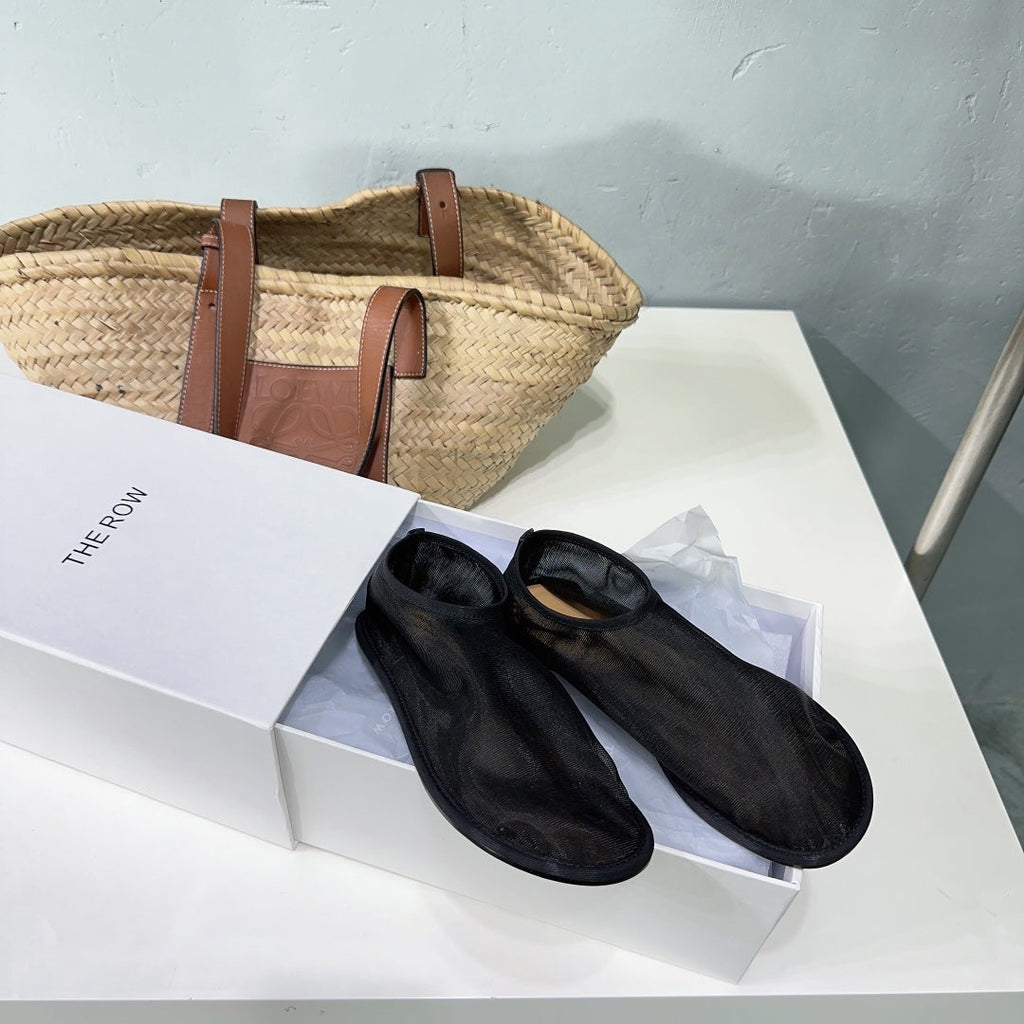 THE ROW 26S SOCK FLATS IN BLACK MESH