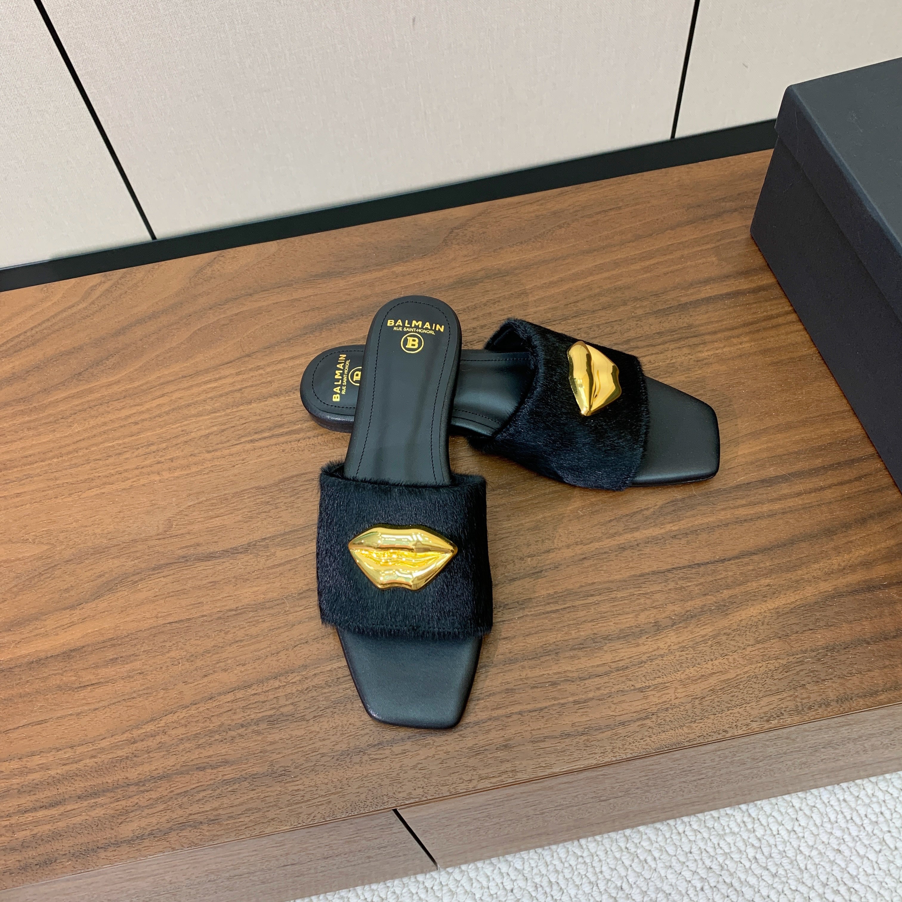 BALMAIN 26S LIP-EMBELLISHED SLIDES IN BLACK PONY HAIR WITH GOLD HARDWARE