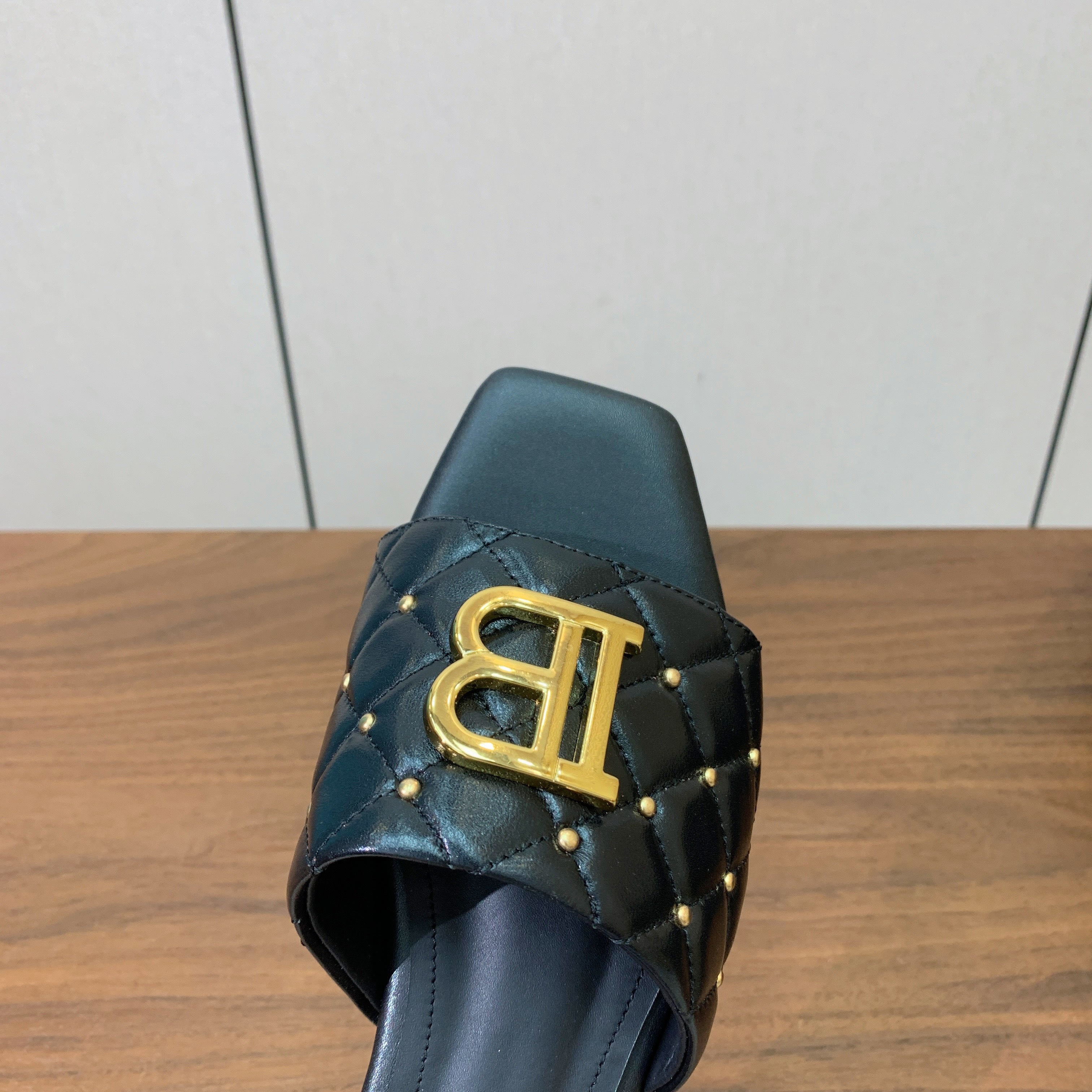 BALMAIN 26S QUILTED MULES IN BLACK CALFSKIN
