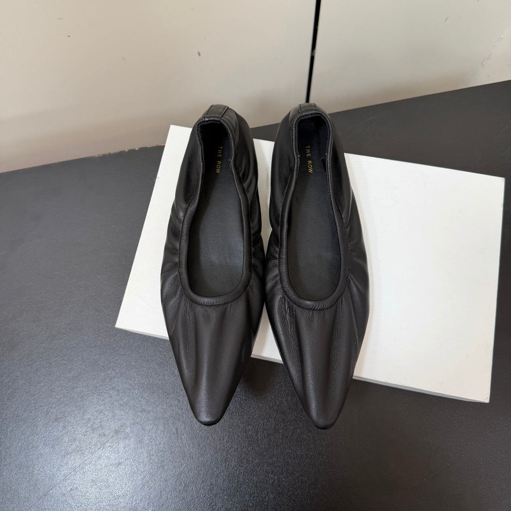 THE ROW 26S POINTED TOE BALLET FLATS IN BLACK LAMBSKIN