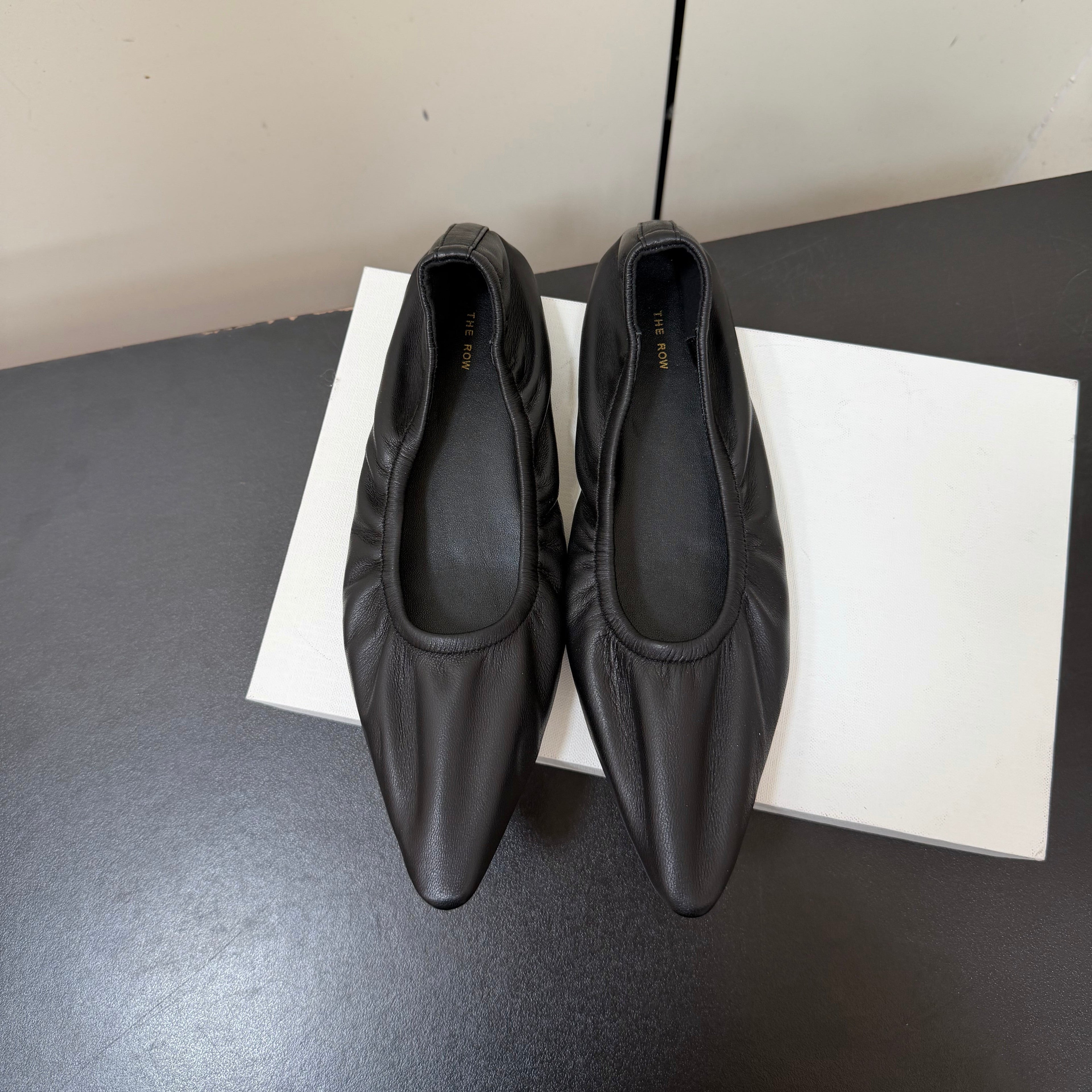 THE ROW 26S POINTED TOE BALLET FLATS IN BLACK LAMBSKIN