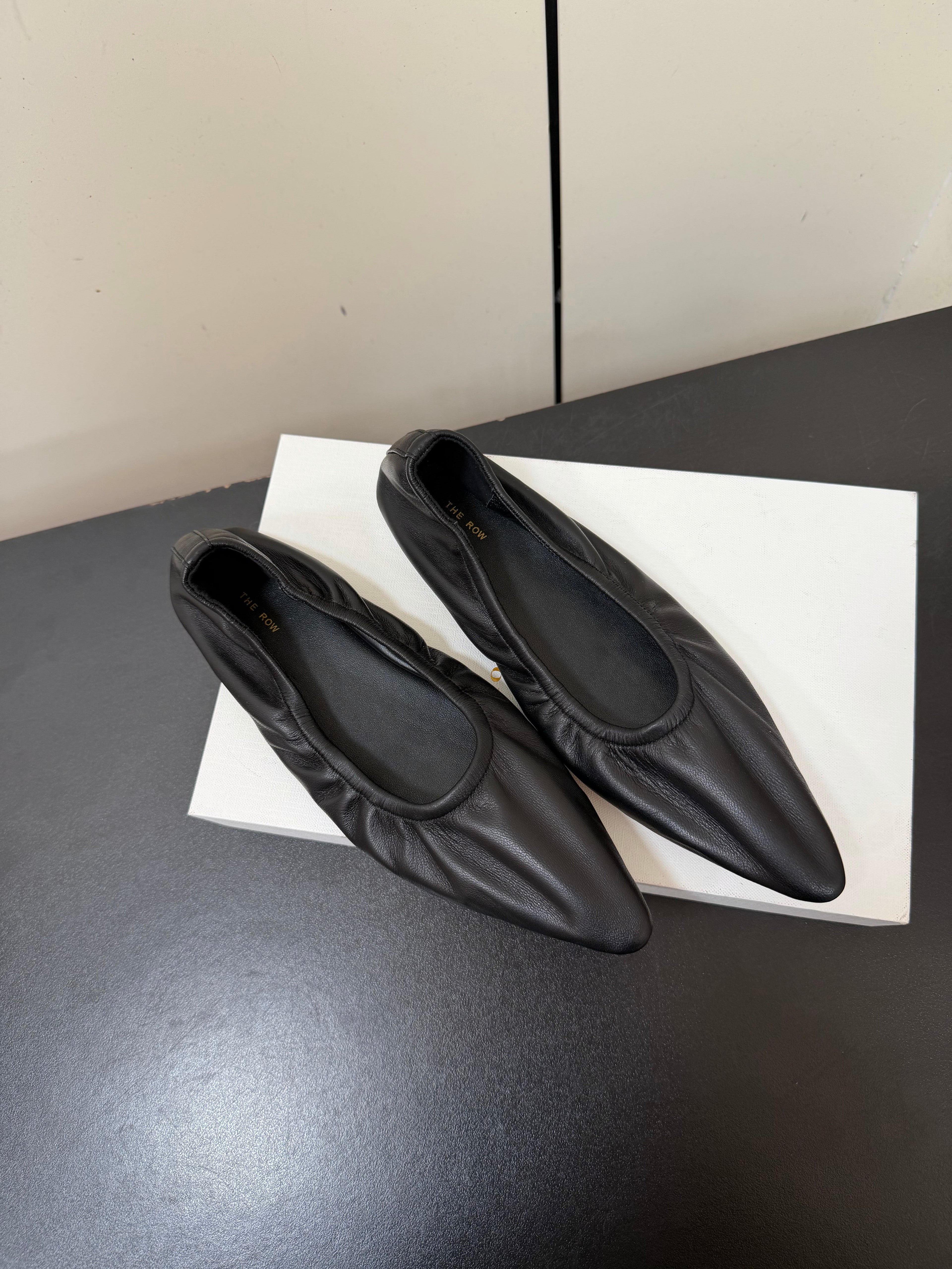 THE ROW 26S POINTED TOE BALLET FLATS IN BLACK LAMBSKIN