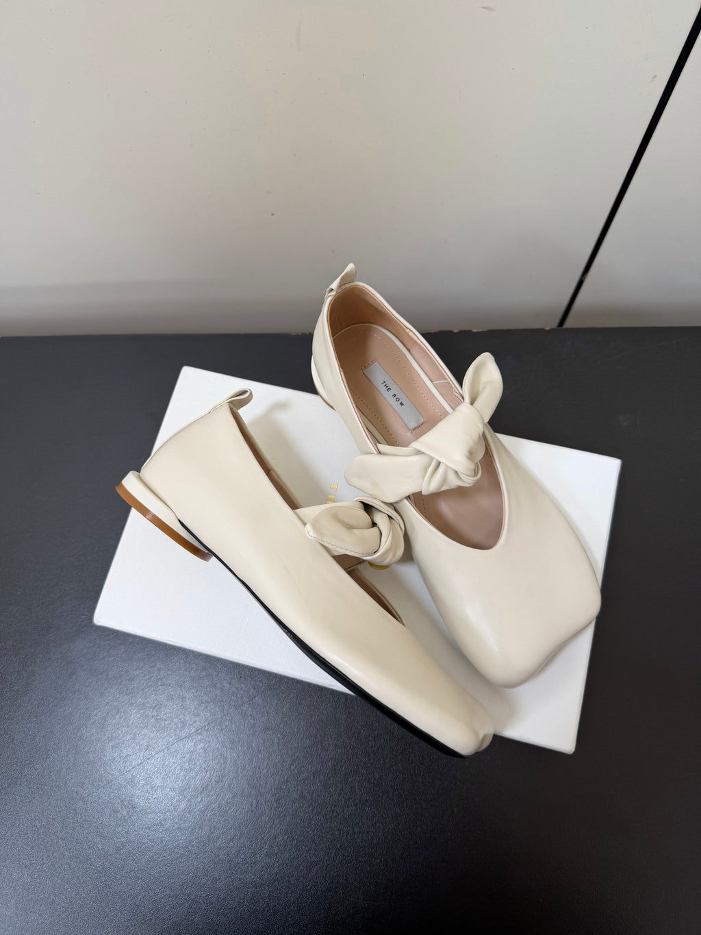 THE ROW 26S BALLET FLATS IN IVORY WHITE KNOT DETAIL CALFSKIN WITH SQUARE TOE