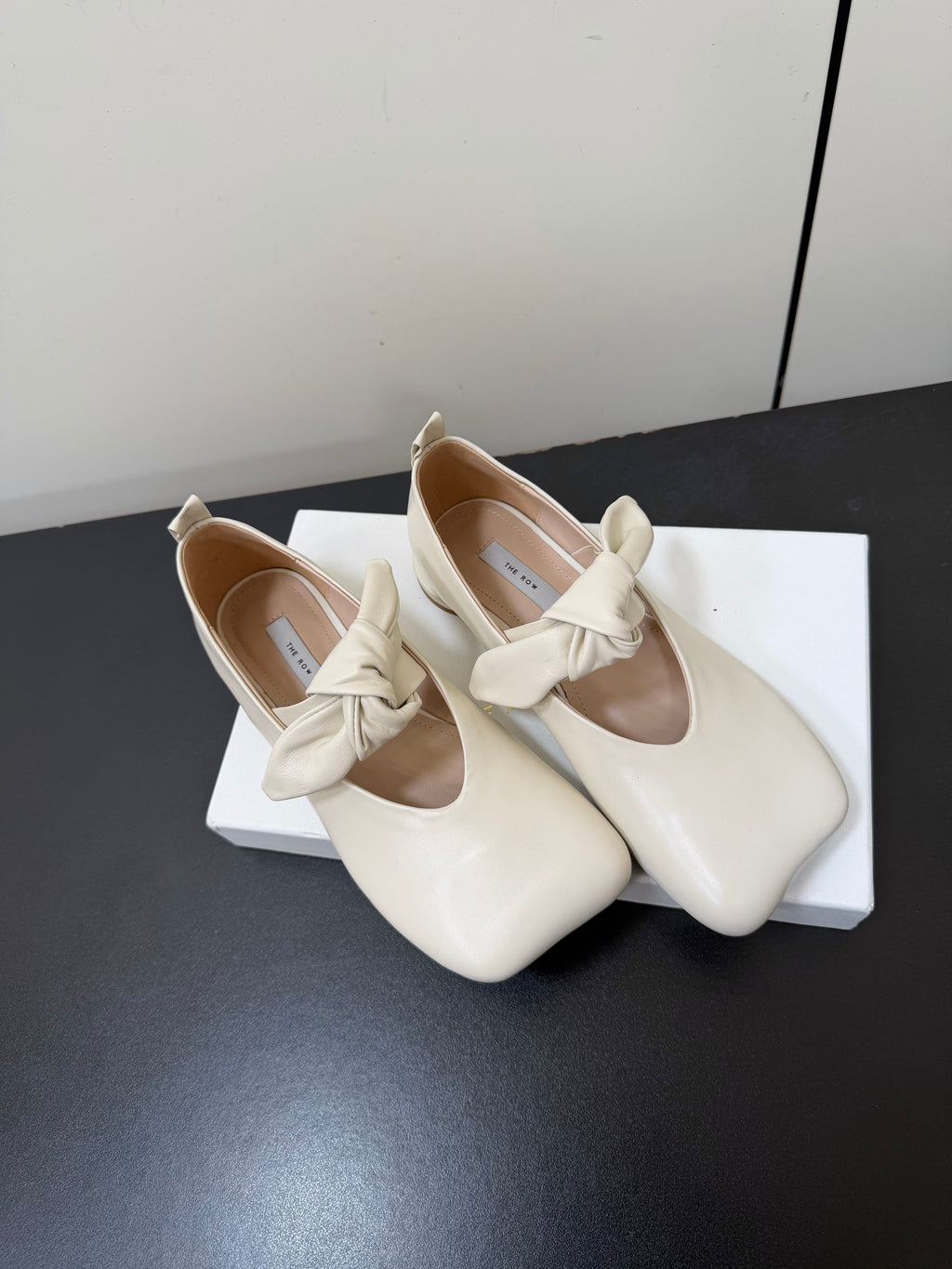 THE ROW 26S BALLET FLATS IN IVORY WHITE KNOT DETAIL CALFSKIN WITH SQUARE TOE
