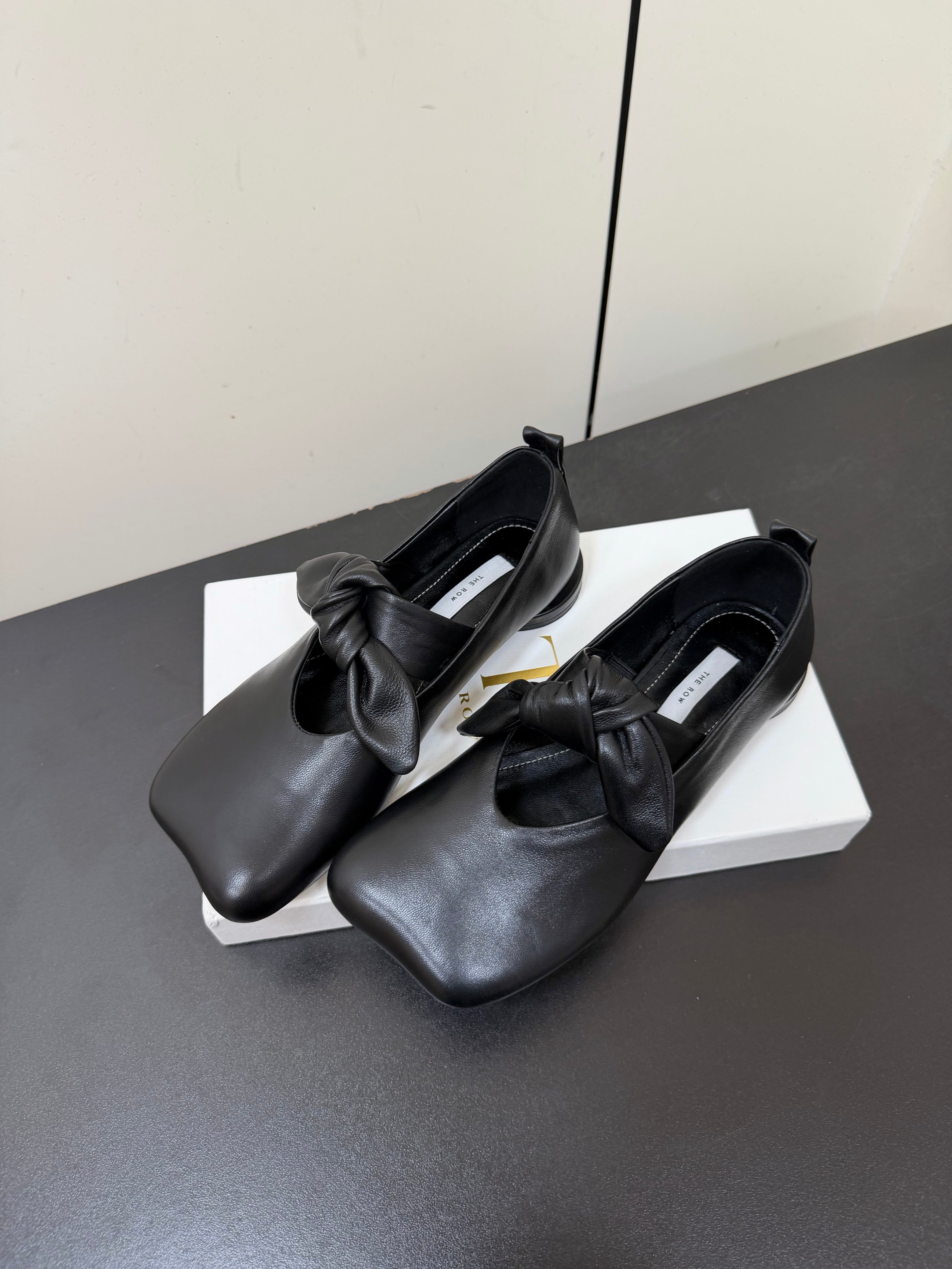 THE ROW 26S BALLET FLATS IN BLACK KNOT DETAIL CALFSKIN WITH SQUARE TOE