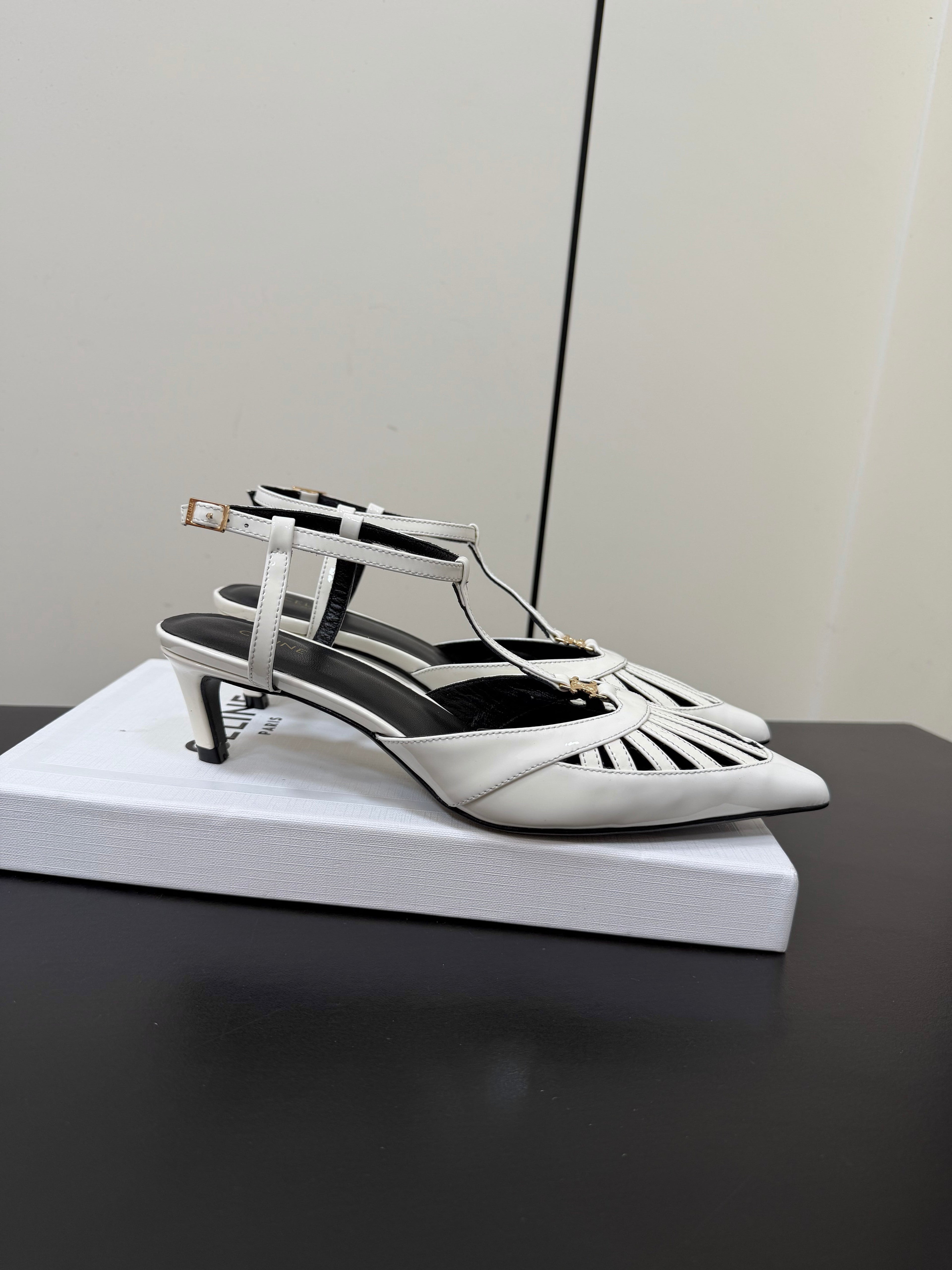 CELINE 26S TRIOMPHE T-STRAP SLINGBACK PUMPS IN WHITE PATENT CALFSKIN
