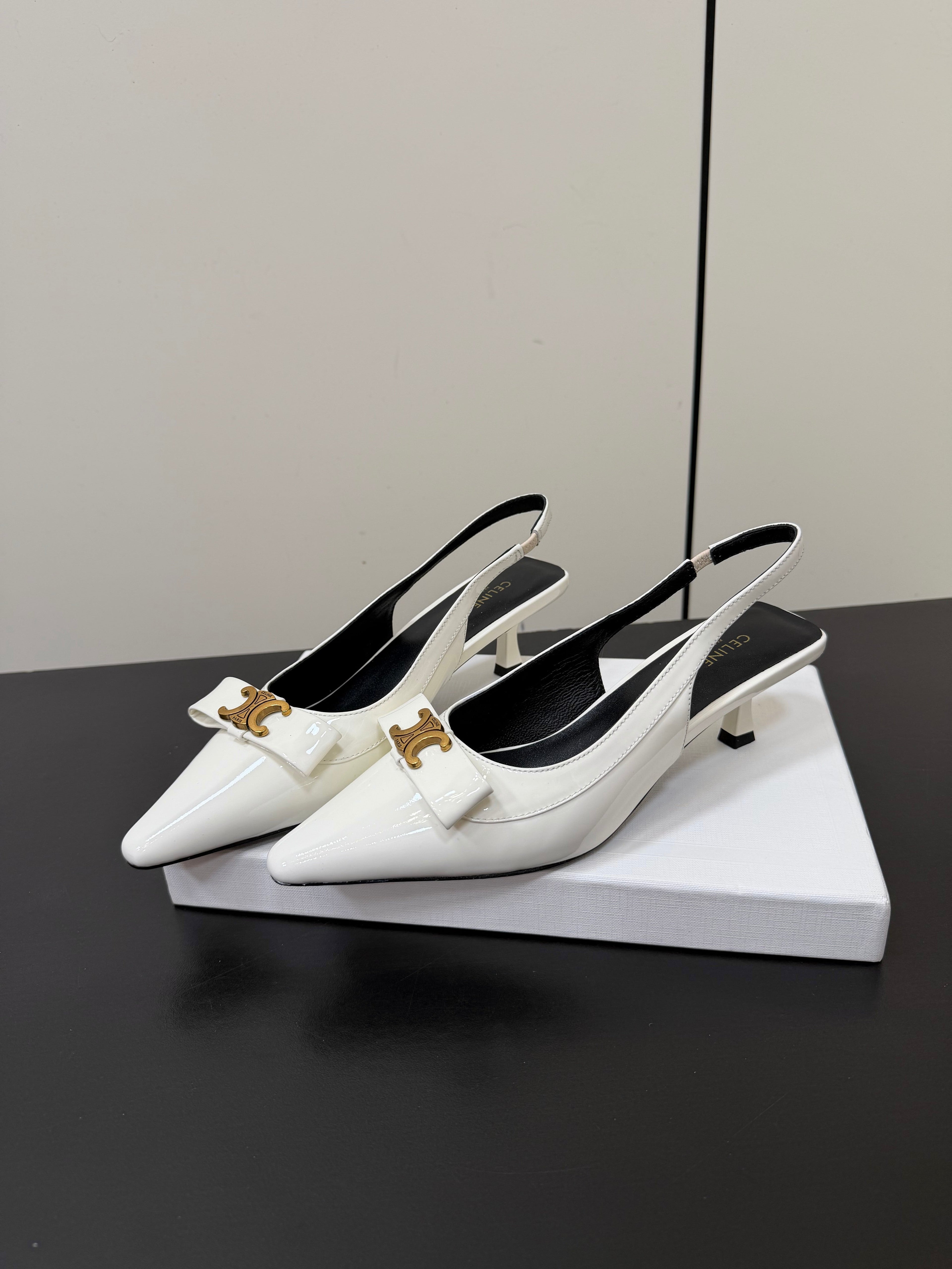 CELINE 26S TRIOMPHE SLINGBACK PUMPS IN WHITE PATENT CALFSKIN GOLD HARDWARE