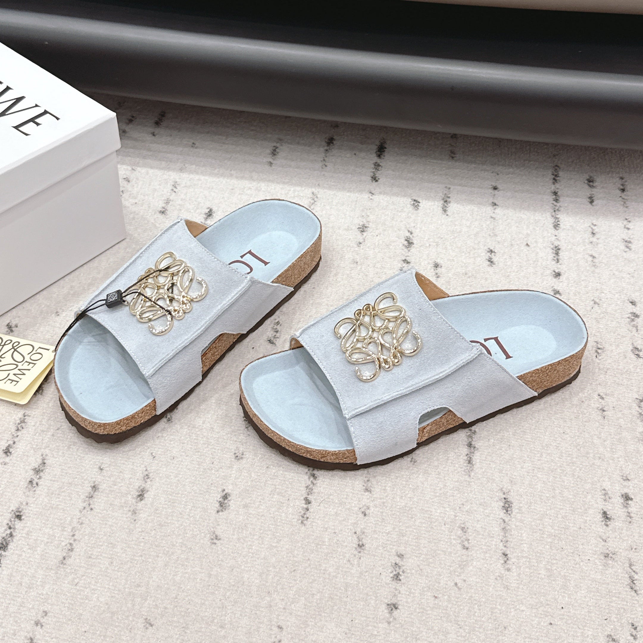 LOEWE 26S FLAT SANDALS IN LIGHT BLUE LOGO GOLD HARDWARE