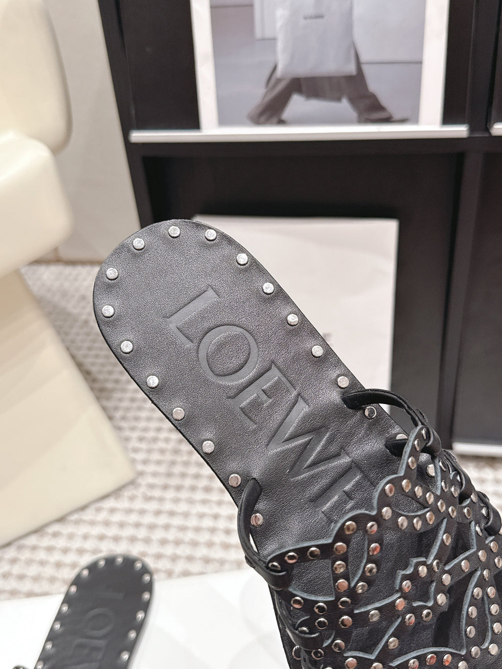 LOEWE 26S PETAL ANAGRAM SLIDE IN BLACK CALFSKIN WITH STUDS