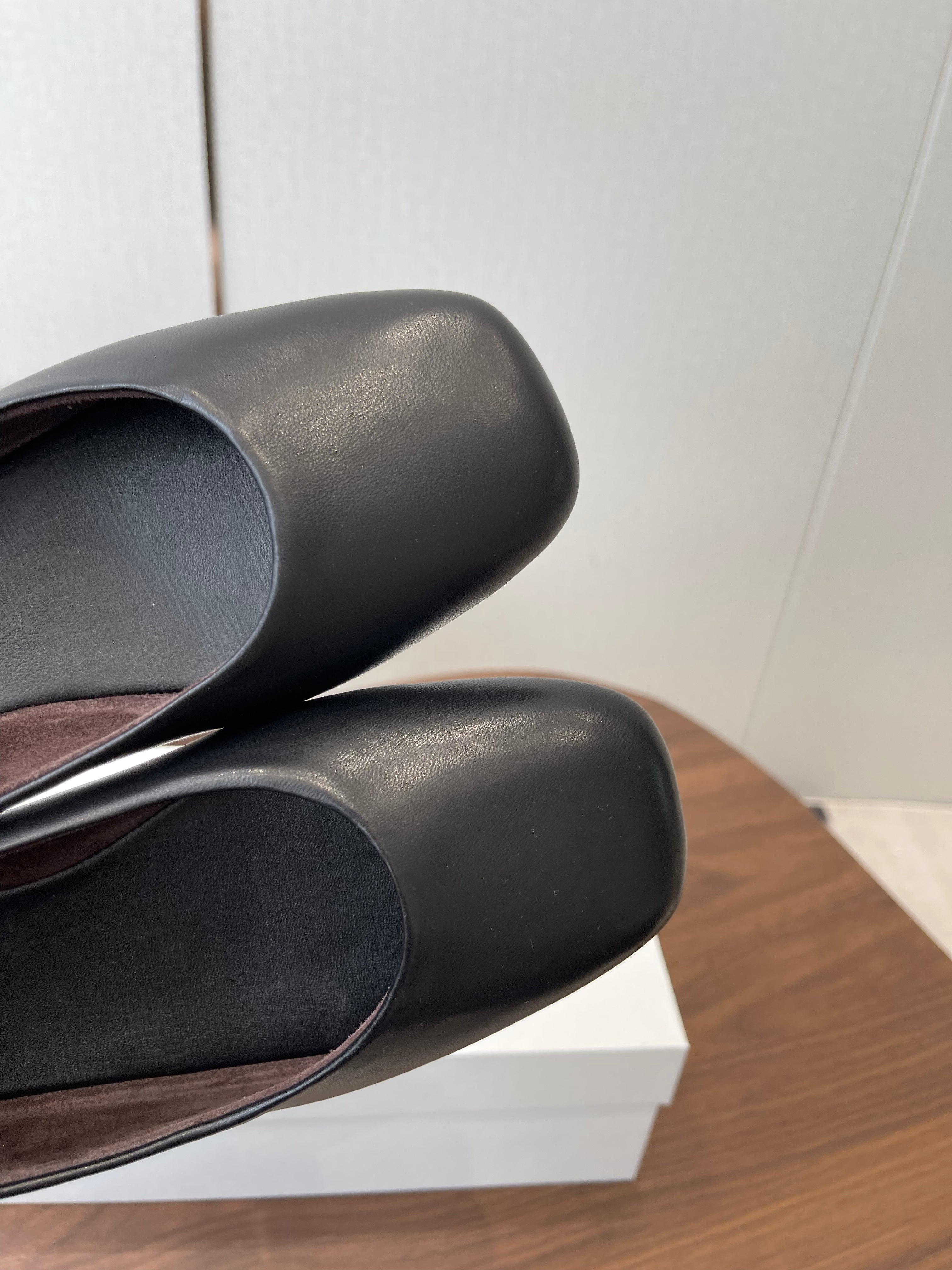 THE ROW 26S FLATS IN BLACK CALFSKIN