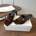 THE ROW 26S BUTTON DETAIL MULE HEELS 70MM IN BROWN SUEDE