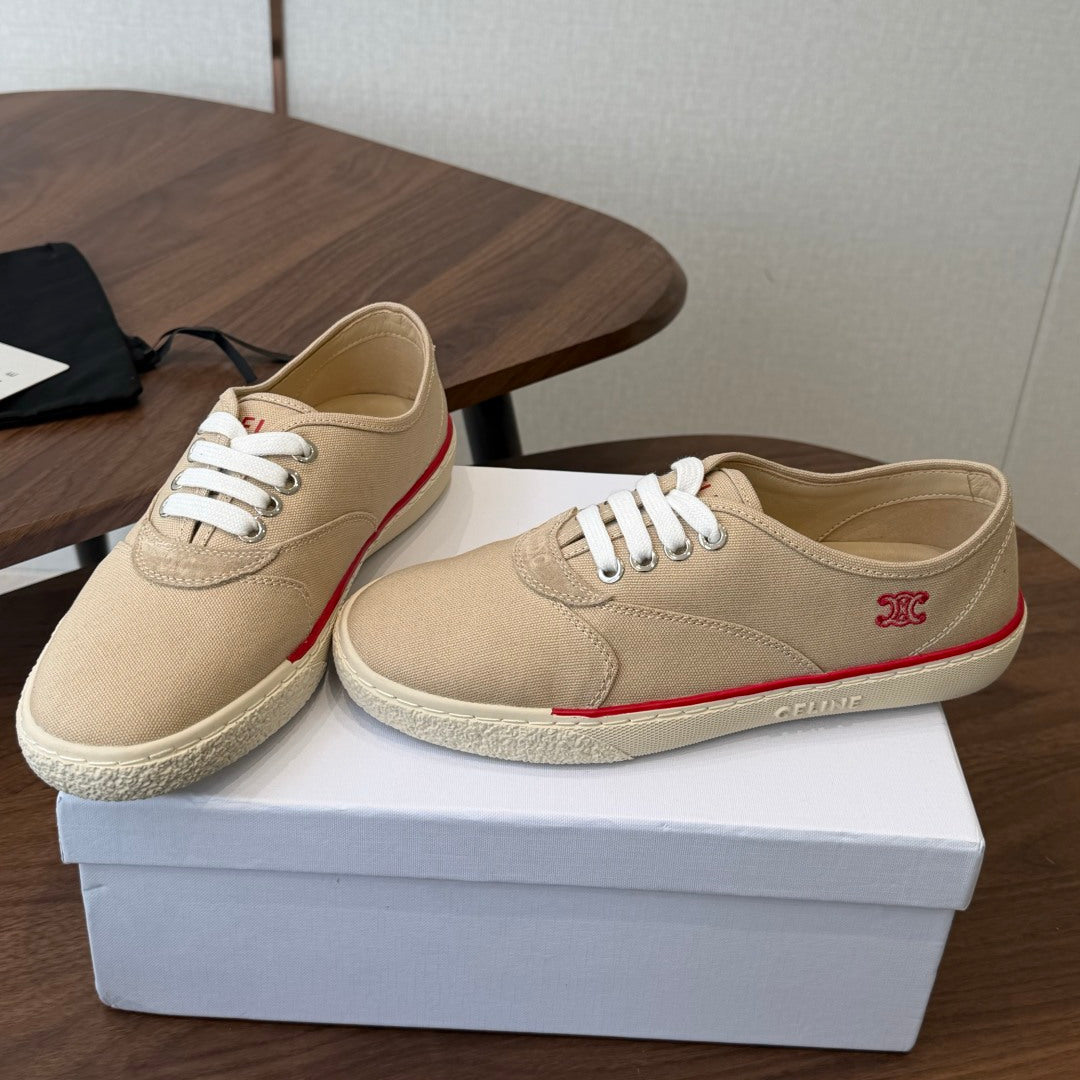 CELINE 26S TRIOMPHE LOW TOP SNEAKERS IN BEIGE CANVAS RED TRIM