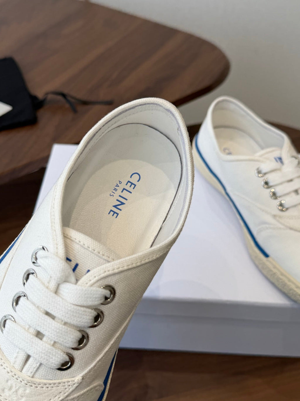 CELINE 26S TRIOMPHE LOW TOP SNEAKERS IN WHITE CANVAS BLUE TRIM