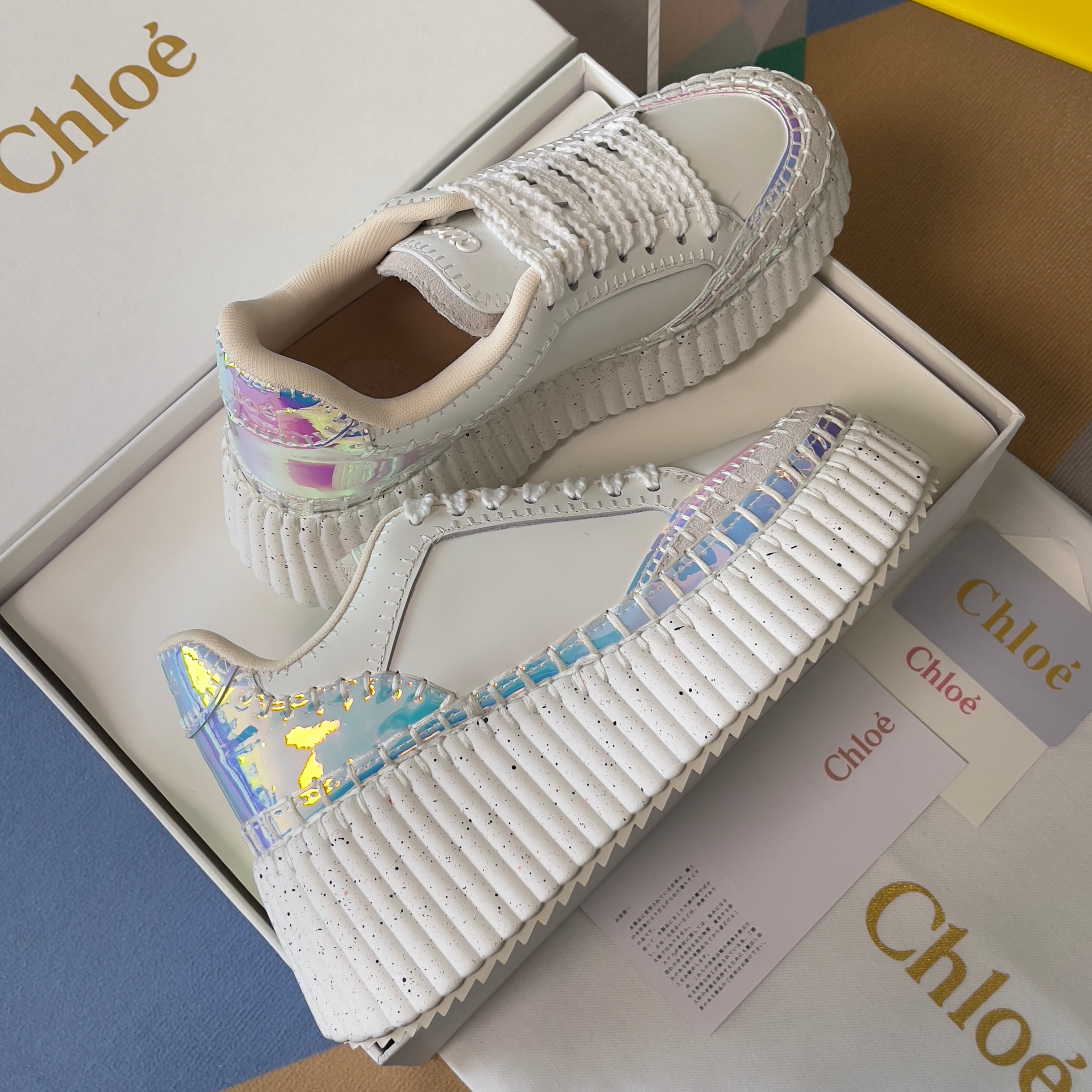 CHLOÉ 26S WEDGE SNEAKERS 70 MM IN WHITE CALFSKIN AND HOLOGRAM