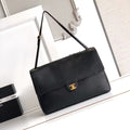 CHANEL 26S SOUPLISSIMO MAXI FLAP 39 IN BLACK GRAINED CALFSKIN GOLD HARDWARE