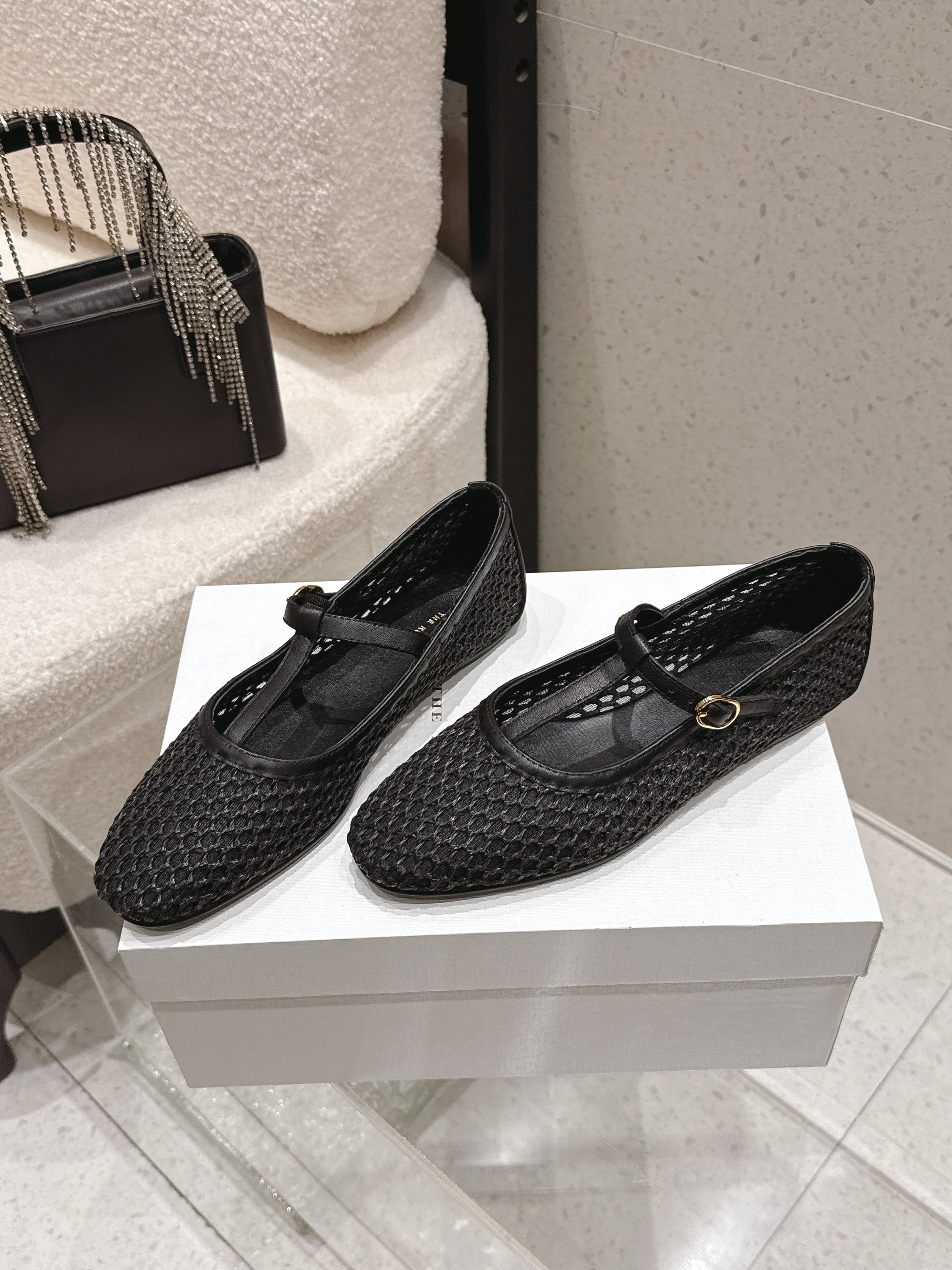 THE ROW 26S MARY JANE FLATS IN BLACK CALFSKIN AND MESH