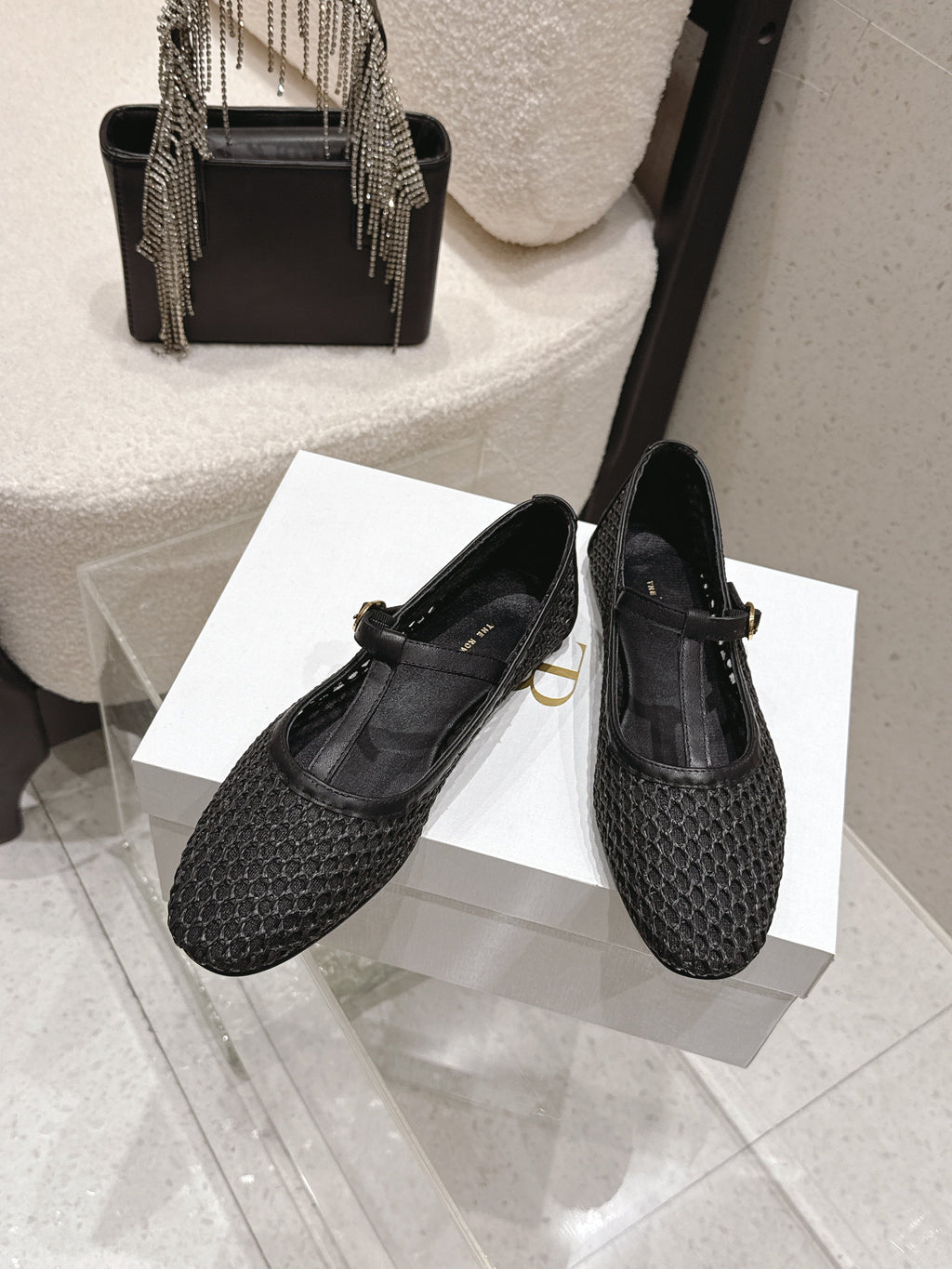 THE ROW 26S MARY JANE FLATS IN BLACK CALFSKIN AND MESH