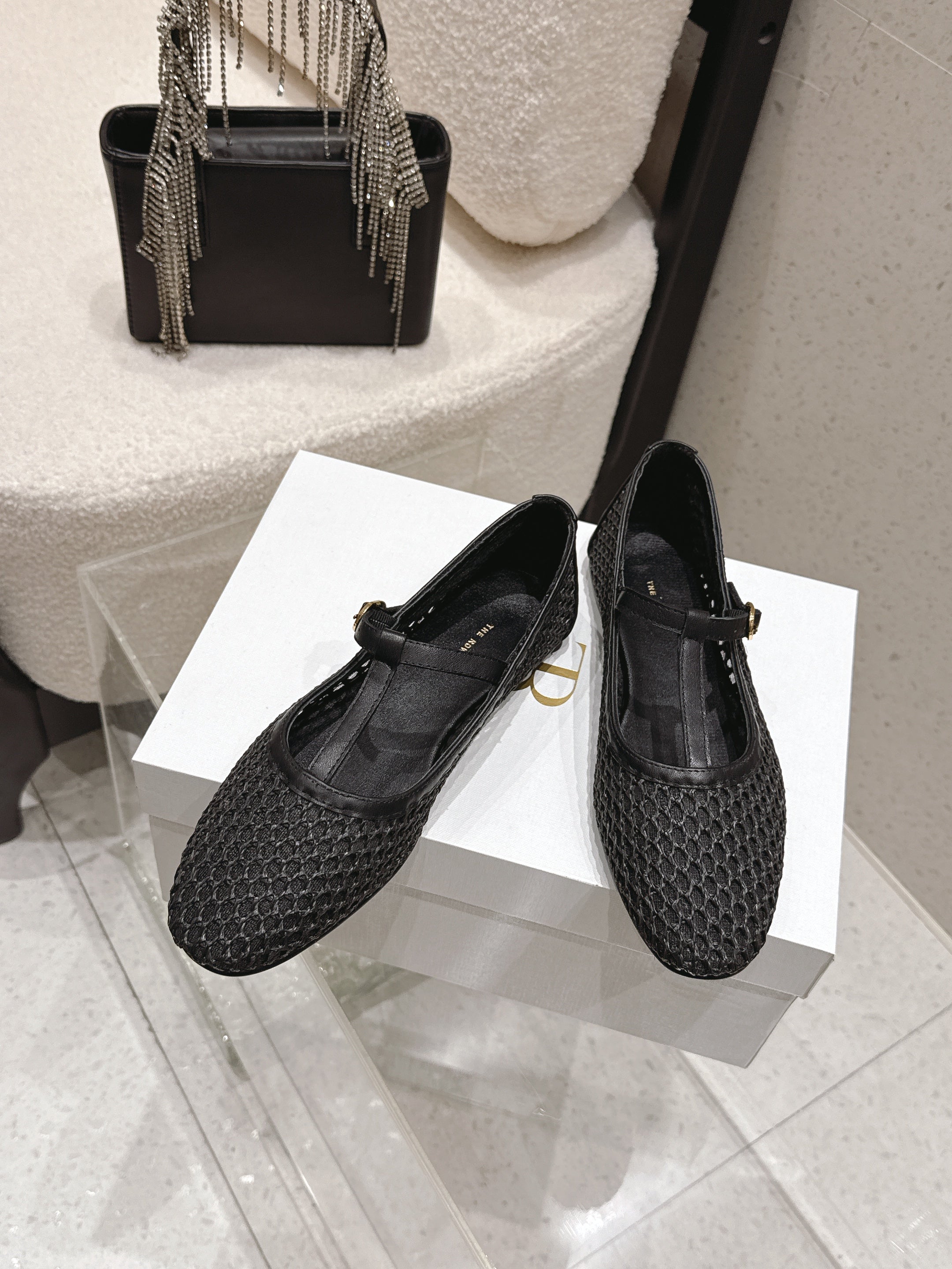 THE ROW 26S MARY JANE FLATS IN BLACK CALFSKIN AND MESH