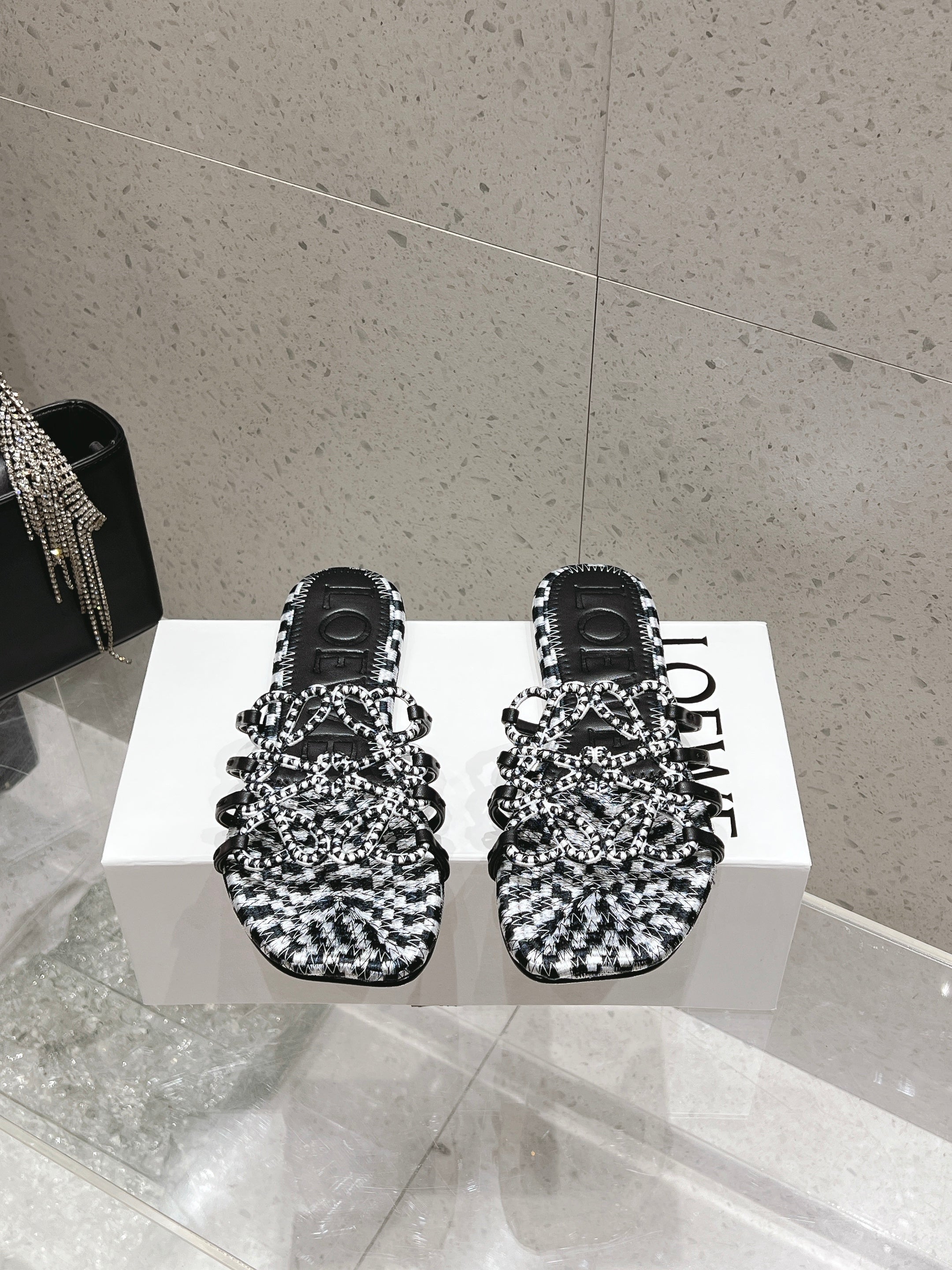 LOEWE 26S BRAIDED CAGE SLIDE SANDALS IN BLACK AND WHITE CALFSKIN