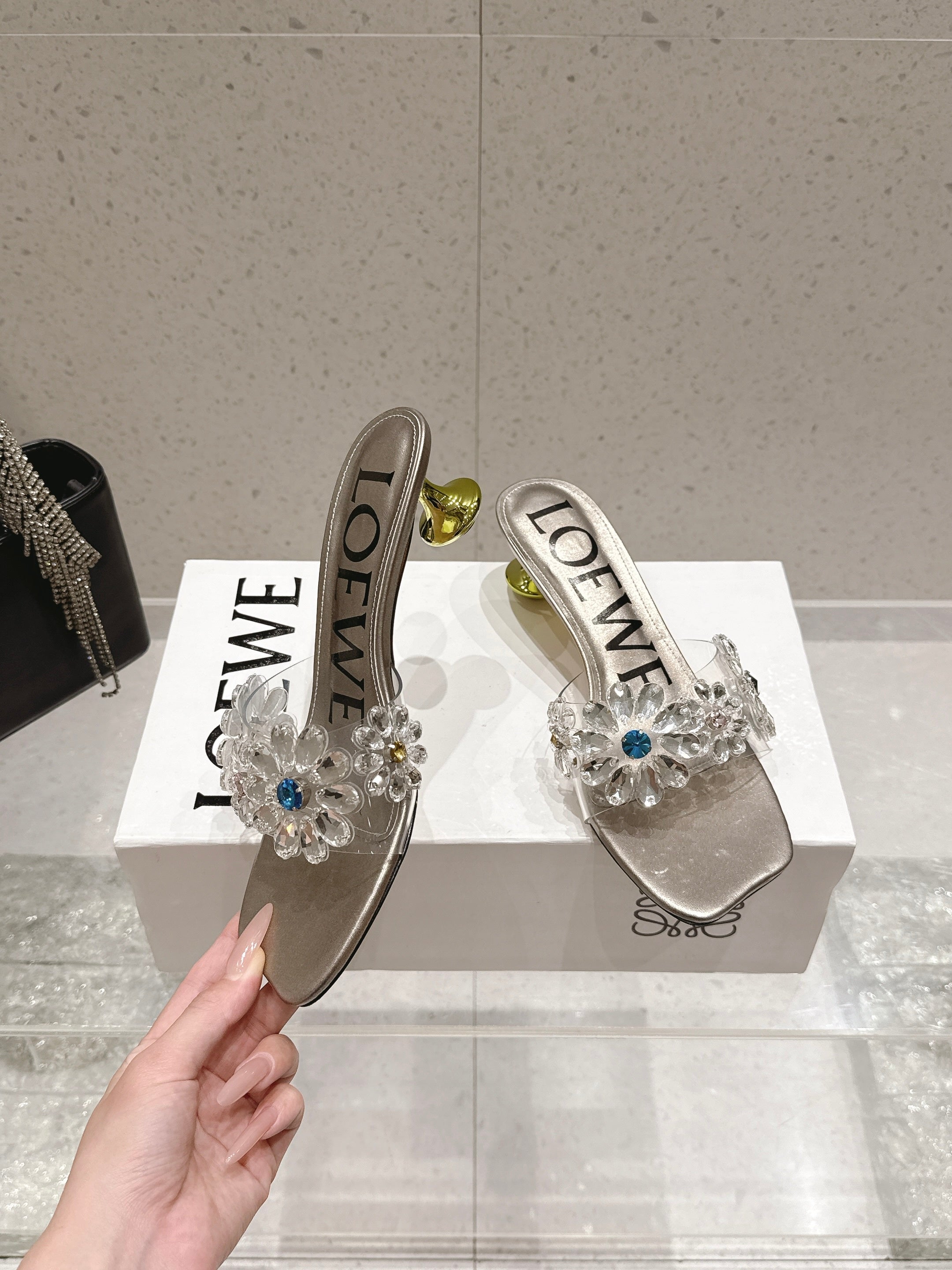 LOEWE 26S MULE HEELS 45MM IN LIGHT GREY PVC WITH CRYSTAL FLORAL