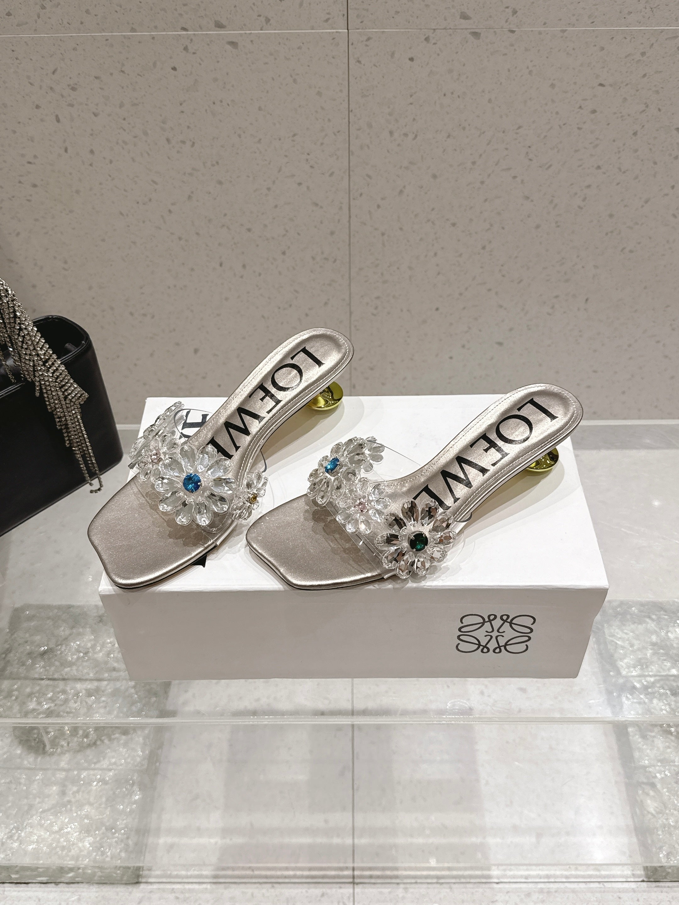 LOEWE 26S MULE HEELS 45MM IN LIGHT GREY PVC WITH CRYSTAL FLORAL