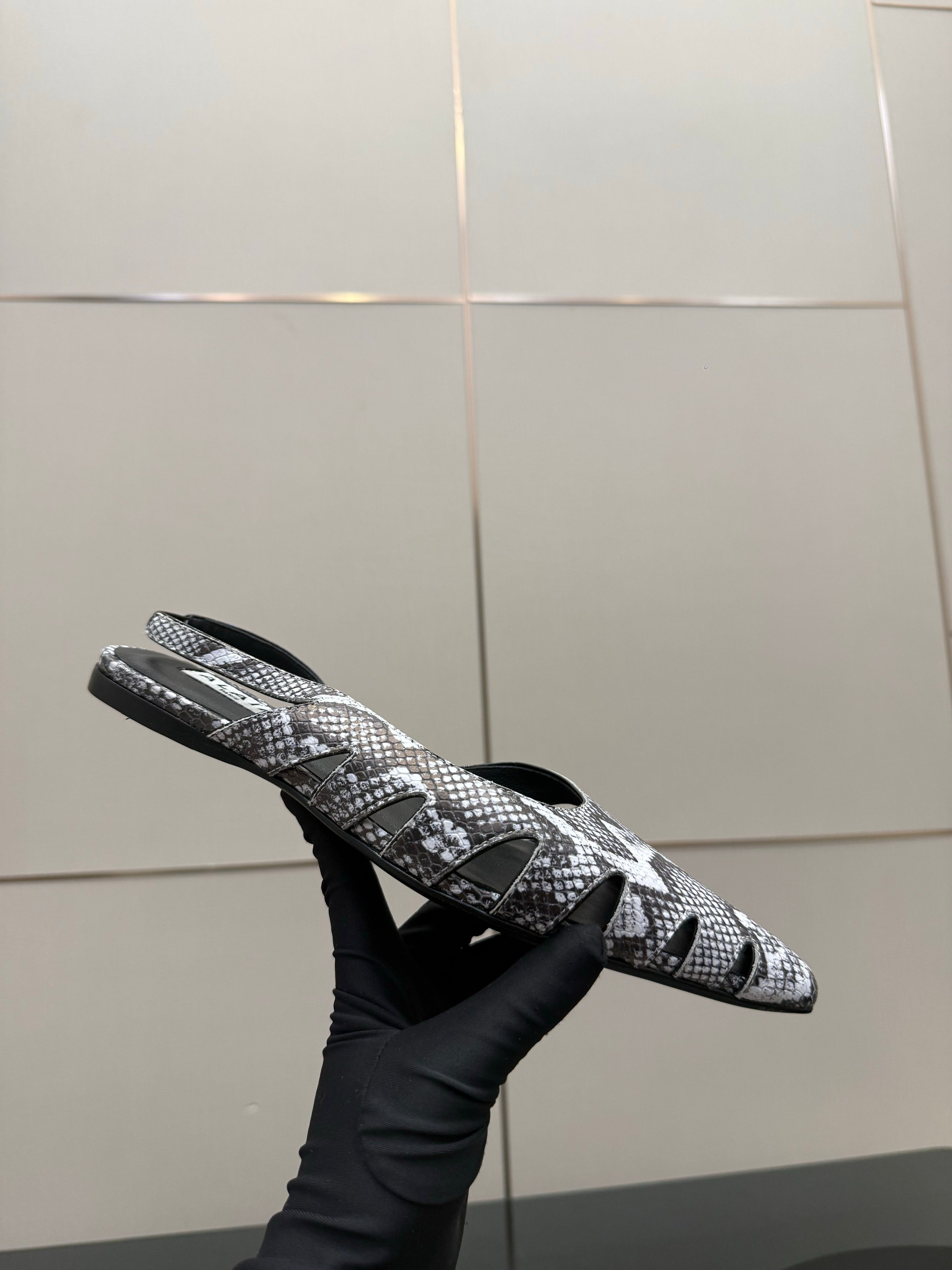 ALAIA 26S CUT-OUT SLINGBACK FLATS IN PYTHON-EMBOSSED LEATHER