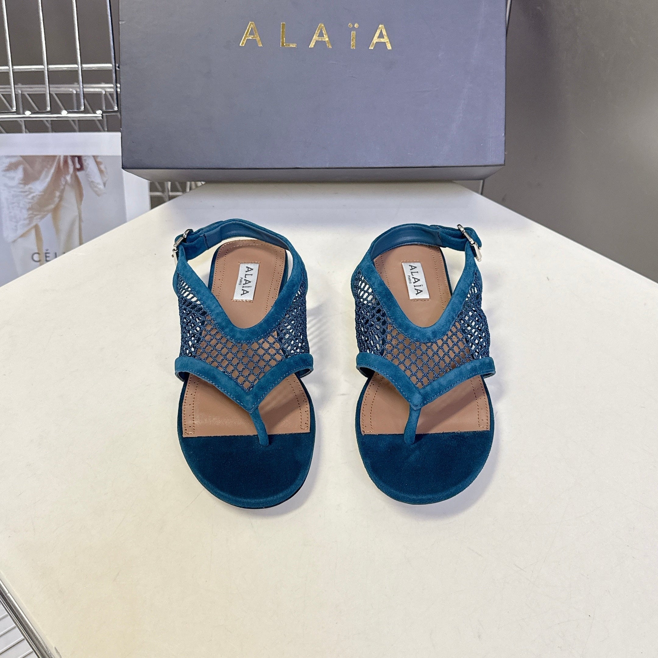 ALAIA 26S FLAT MESH THONG SANDALS IN PETROL BLUE SUEDE
