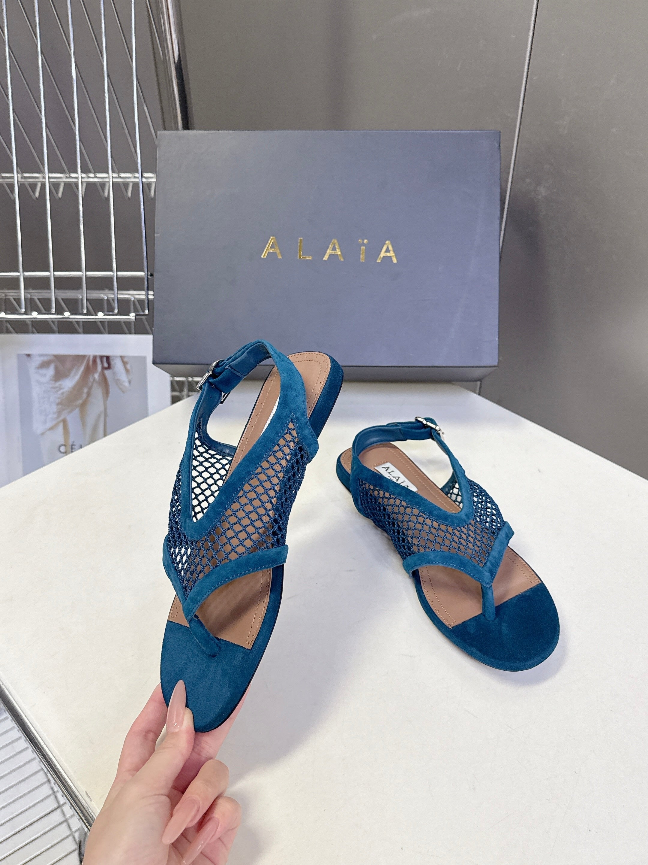 ALAIA 26S FLAT MESH THONG SANDALS IN PETROL BLUE SUEDE