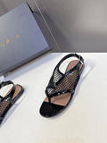 ALAIA 26S FLAT MESH THONG SANDALS IN BLACK PATENT CALFSKIN