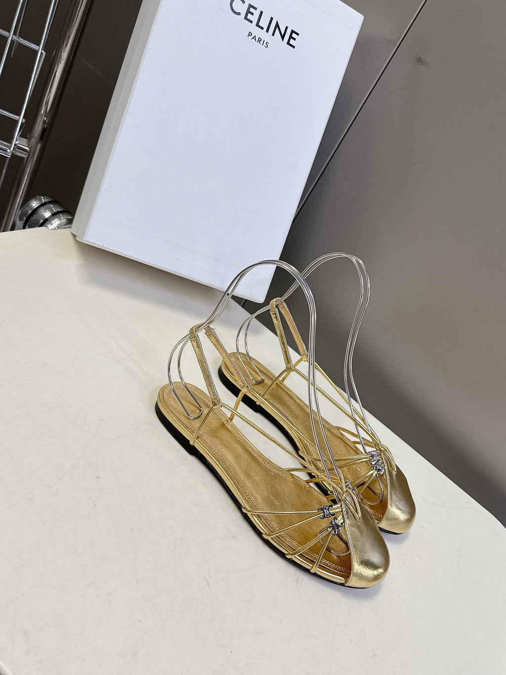CELINE 26S TRIOMPHE LACE UP ANKLE STRAP FLAT SANDALS IN GOLD CALFSKIN