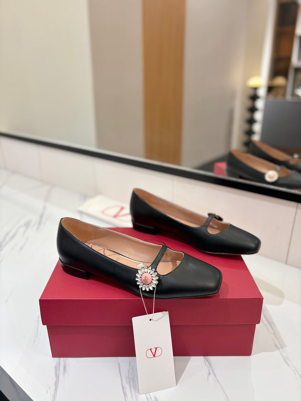 VALENTINO 26S MARY JANE FLATS IN BLACK CALFSKIN WITH CRYSTAL FLOWER