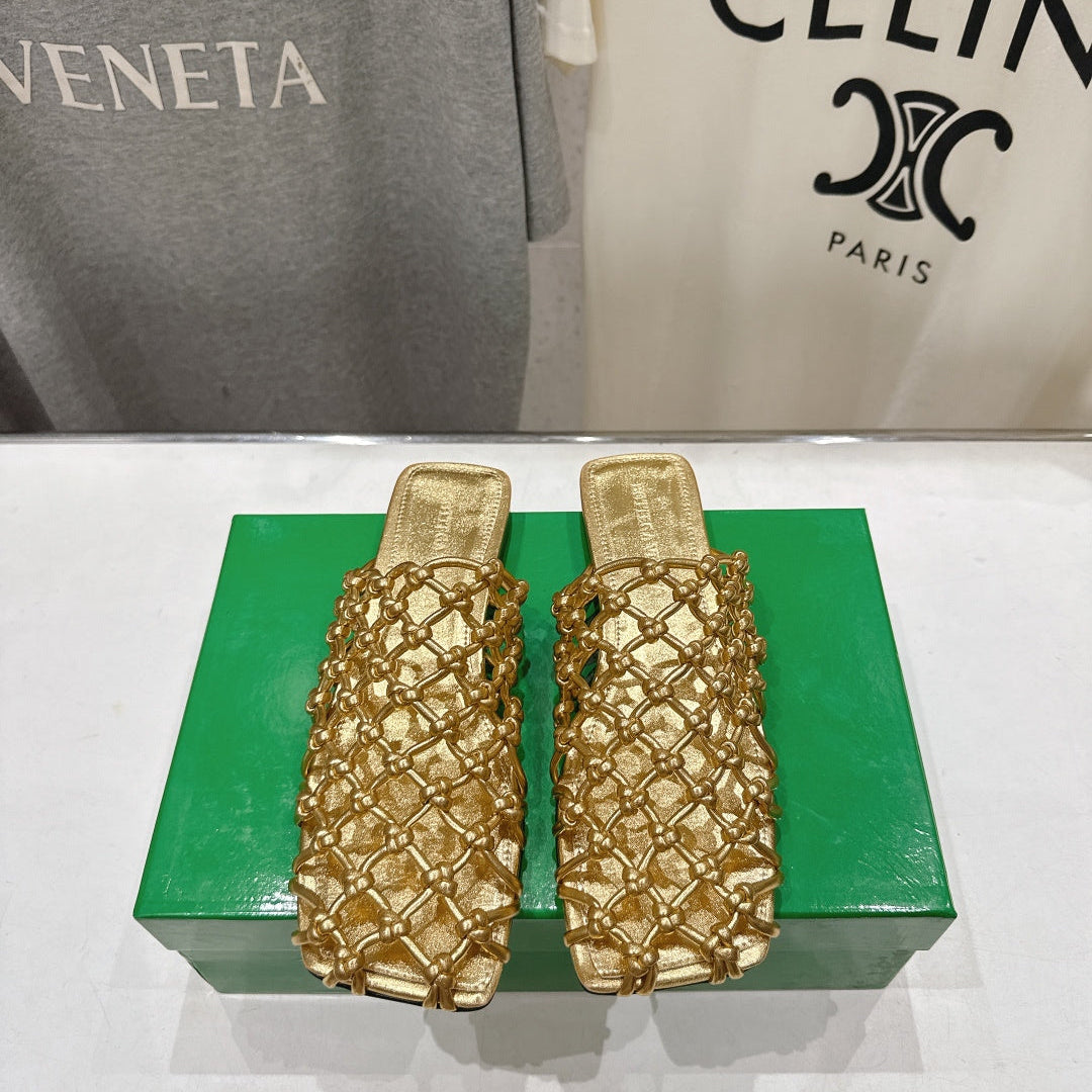 BOTTEGA VENETA 26S WOVEN MULES IN GOLD LAMBSKIN