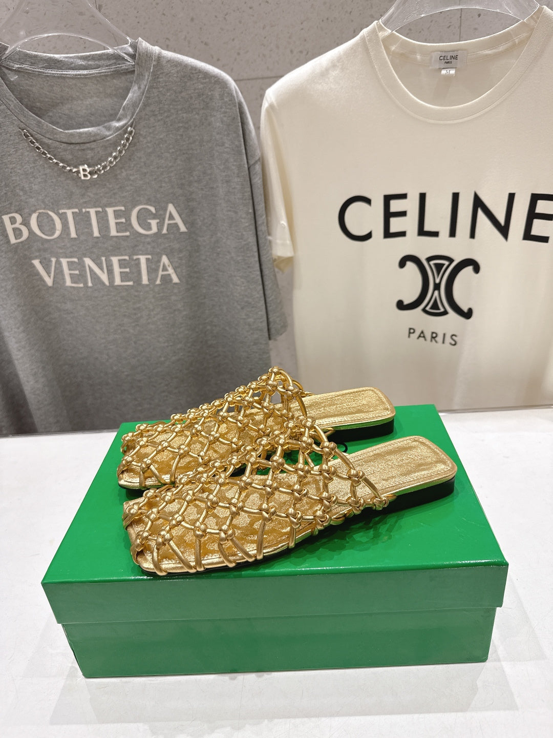 BOTTEGA VENETA 26S WOVEN MULES IN GOLD LAMBSKIN