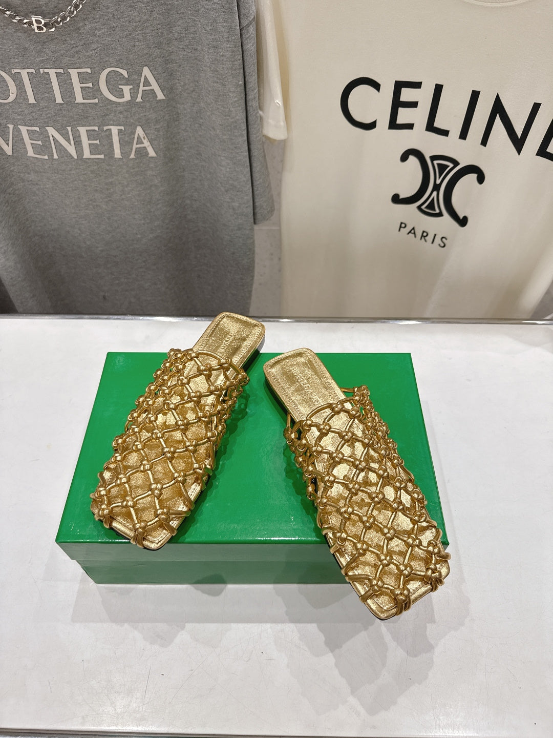 BOTTEGA VENETA 26S WOVEN MULES IN GOLD LAMBSKIN