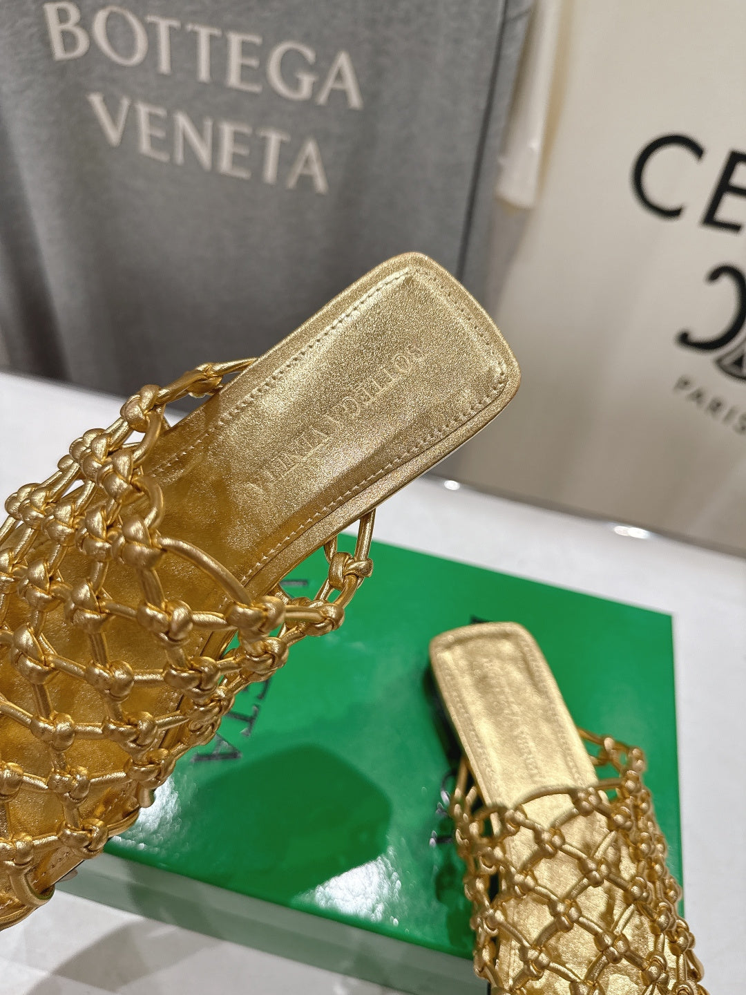 BOTTEGA VENETA 26S WOVEN MULES IN GOLD LAMBSKIN