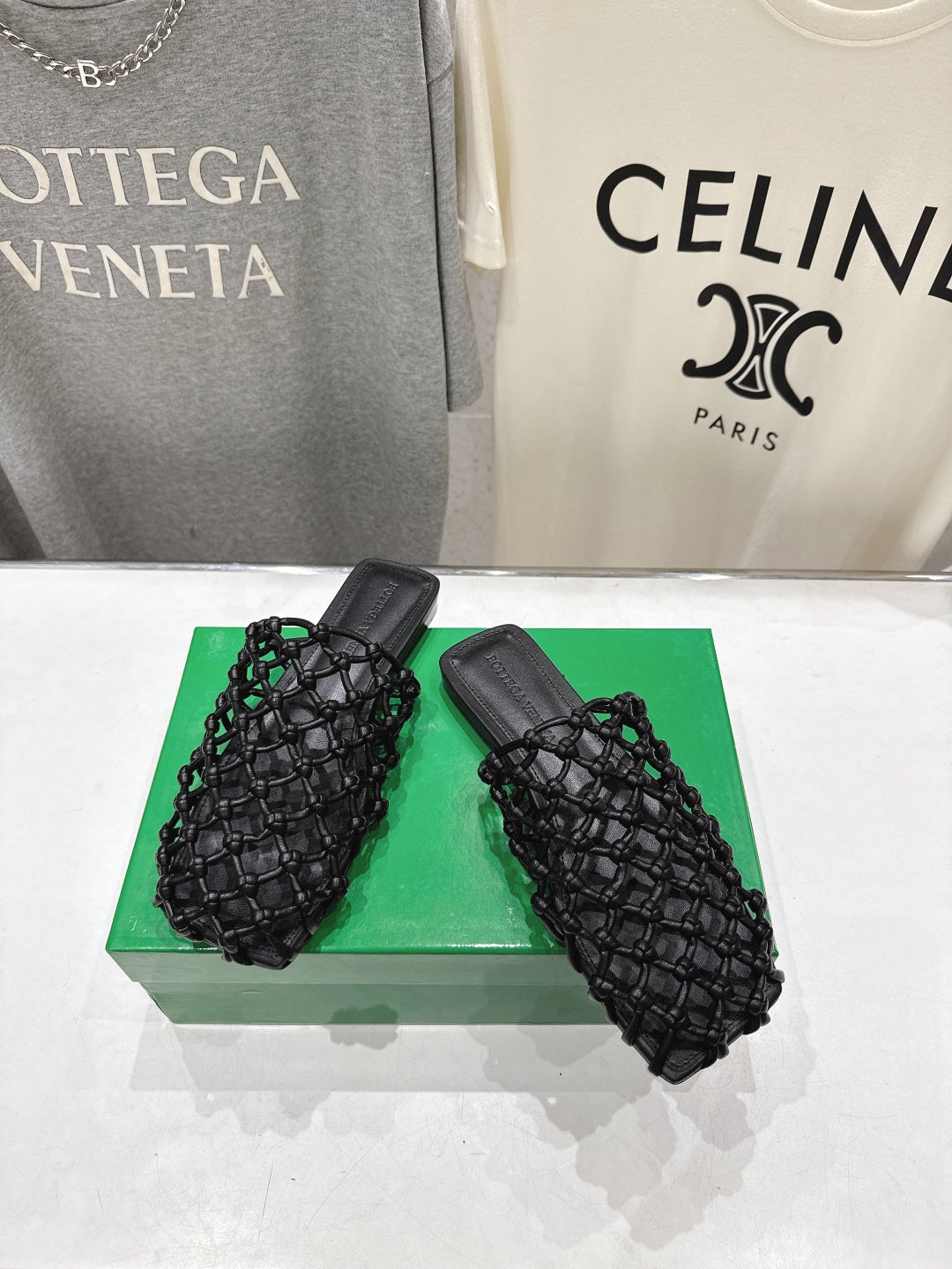 BOTTEGA VENETA 26S WOVEN MULES IN BLACK LAMBSKIN