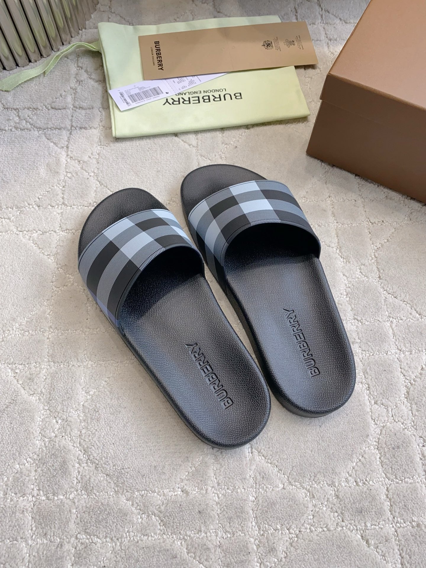 BURBERRY 26S CHECK PRINT RUBBER SLIDES IN BLACK CALFSKIN