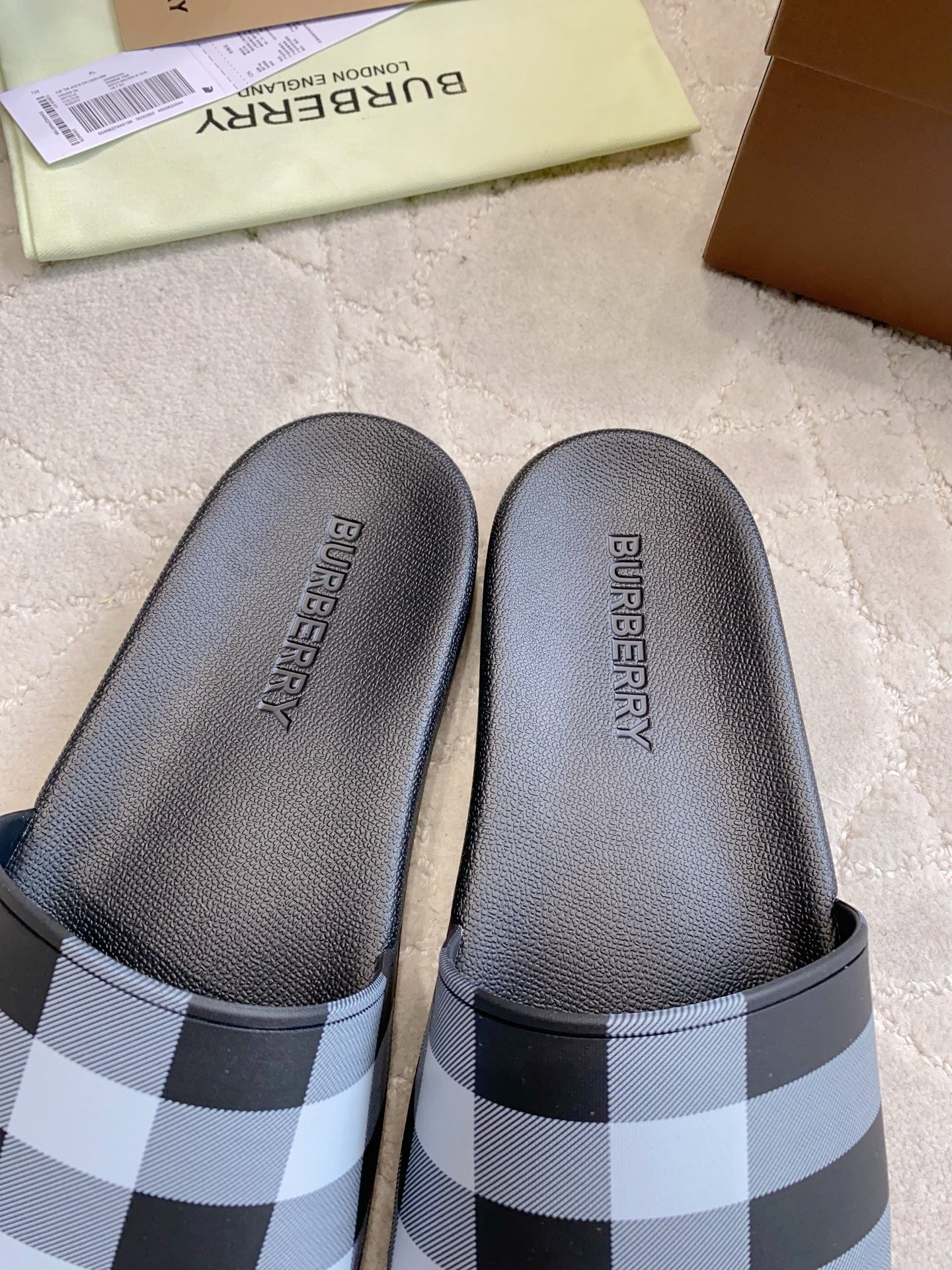 BURBERRY 26S CHECK PRINT RUBBER SLIDES IN BLACK CALFSKIN