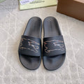 BURBERRY 26S EQUESTRIAN KNIGHT RUBBER SLIDES IN BLACK CALFSKIN