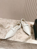 CC FLATS 25S IN WHITE PATENT LEATHER