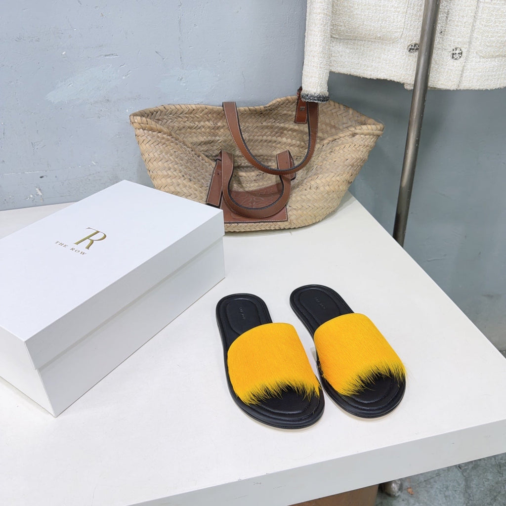 THE ROW 26S SLIDES SANDALS IN YELLOW MINK FUR AND BLACK CALFSKIN