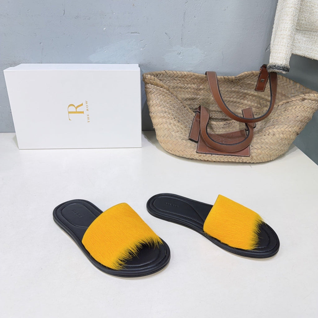 THE ROW 26S SLIDES SANDALS IN YELLOW MINK FUR AND BLACK CALFSKIN