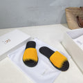 THE ROW 26S SLIDES SANDALS IN YELLOW MINK FUR AND BLACK CALFSKIN
