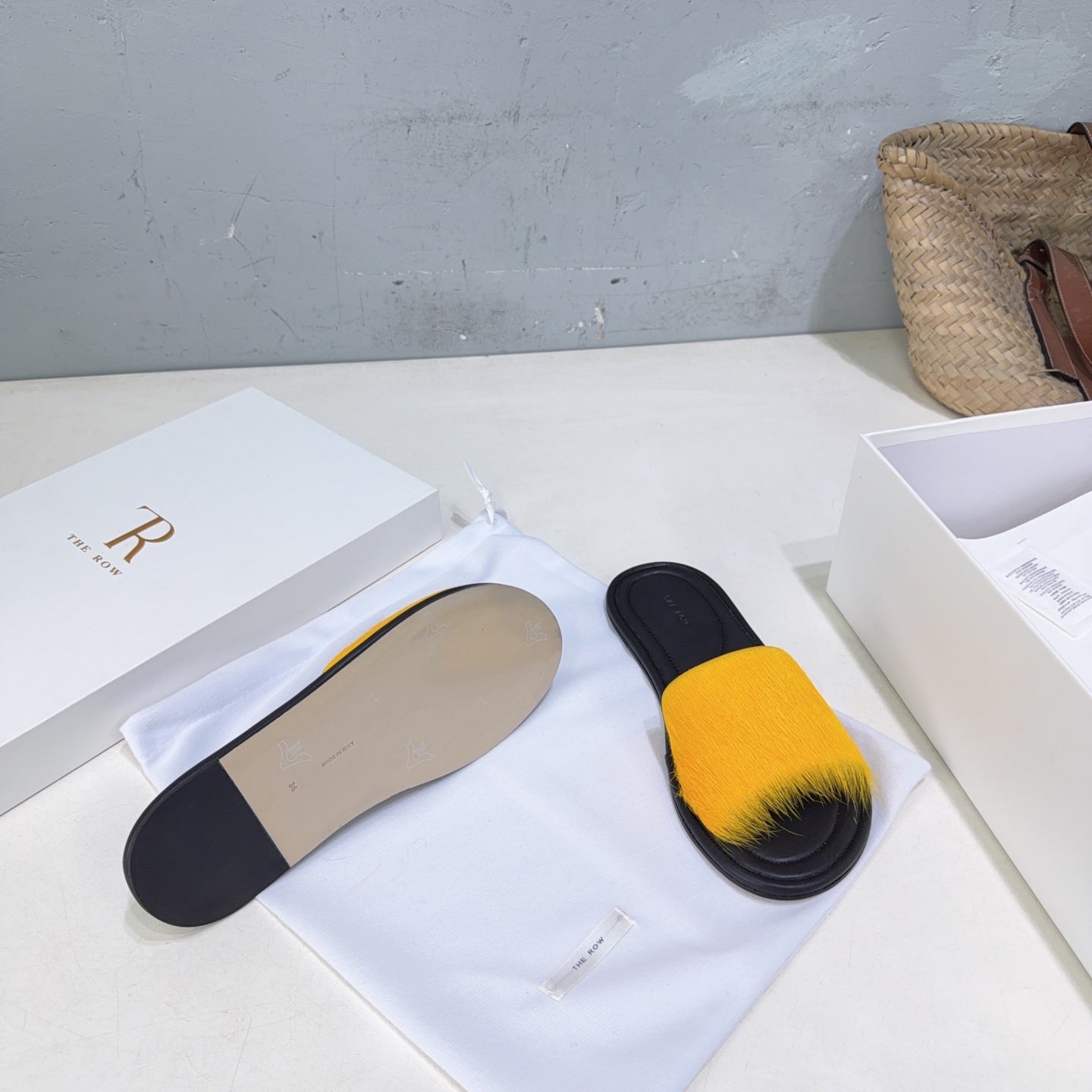 THE ROW 26S SLIDES SANDALS IN YELLOW MINK FUR AND BLACK CALFSKIN