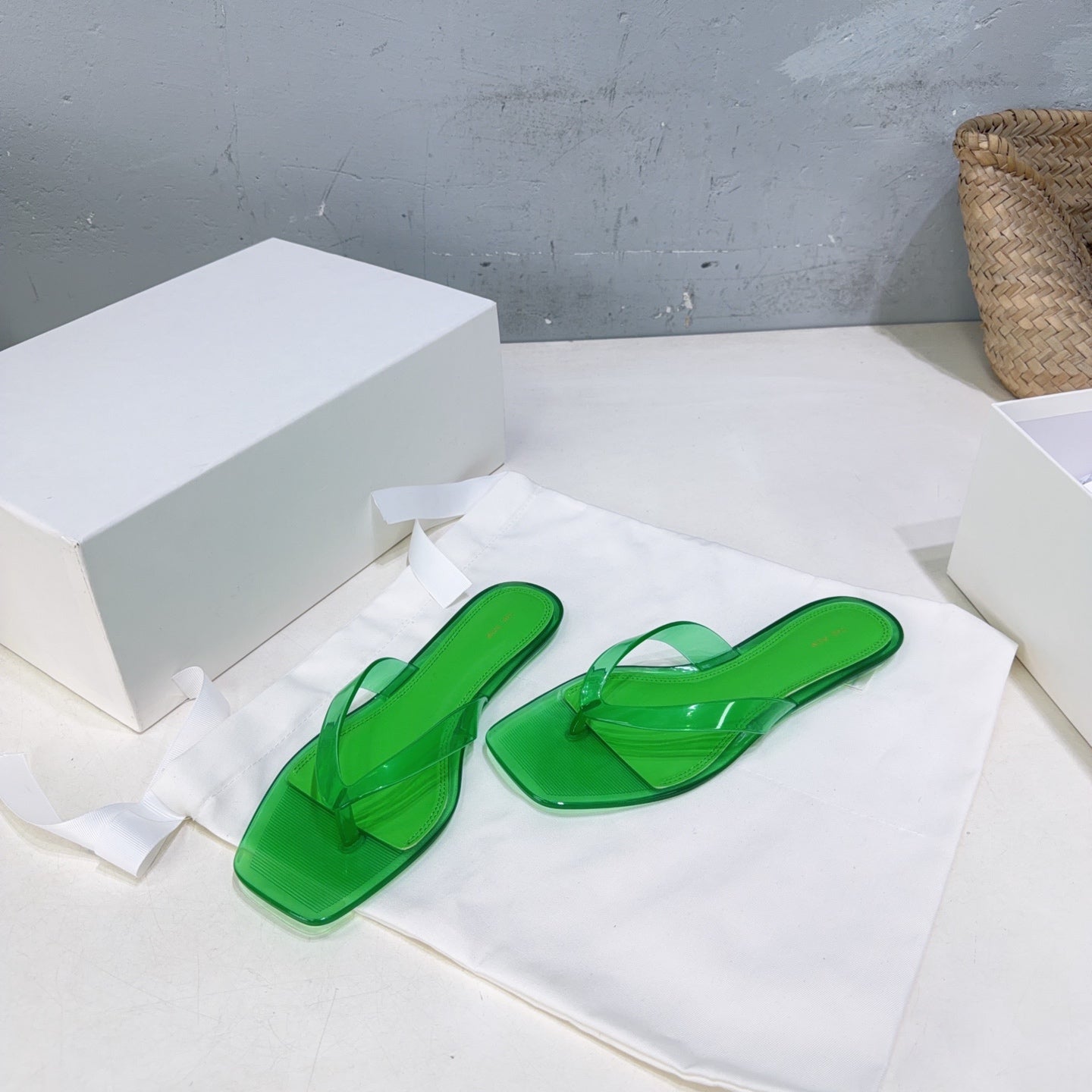 THE ROW 26S SQUARE TOE THONG SANDALS IN TRANSLUCENT GREEN PVC WITH SILVER FOOTBED